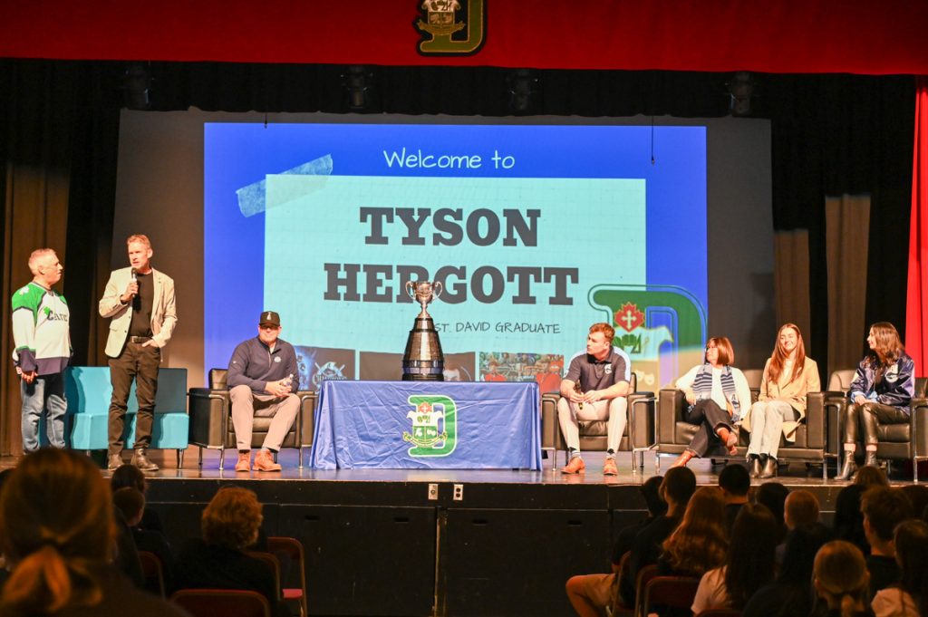 Grey Cup with Tyson Hergott, family and coaches