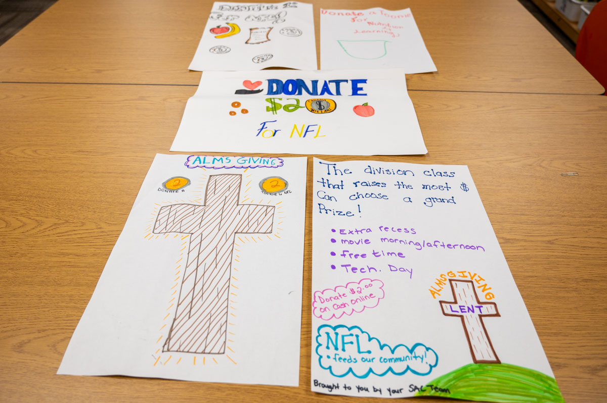 Our Lady of Grace donation posters for Nutrition for Learning fundraiser